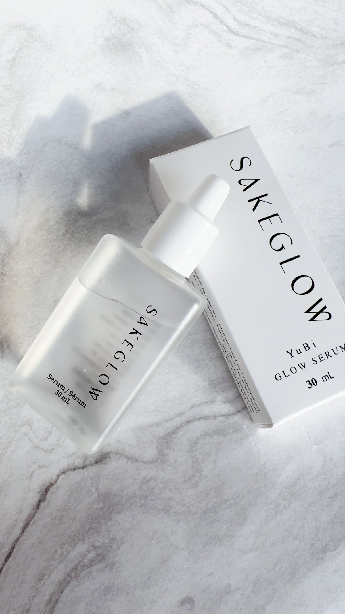 YuBi Glow Serum 30 mL bottle and box by SAKEGLOW